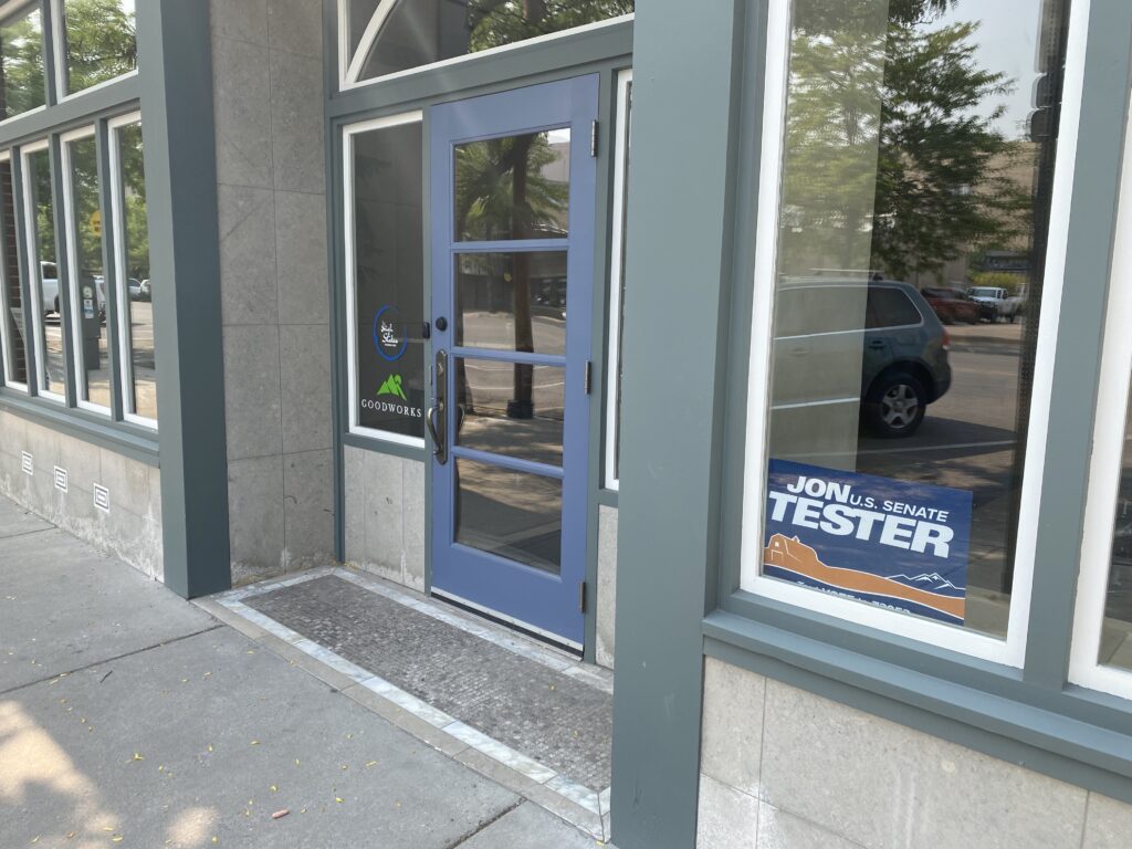 Goodworks office with Jon Tester sign placed in front window