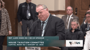 Rep. Llew Jones (HD 18) speaks to House Taxation Committee as sponsor of HB 231