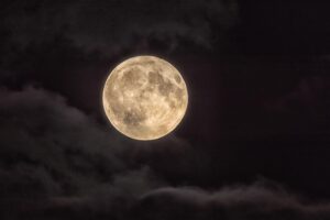 Full Moon Illuminating a Cloudy Night Sky