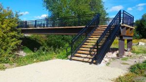 Elevated Black Metal Pedestrian Bridge