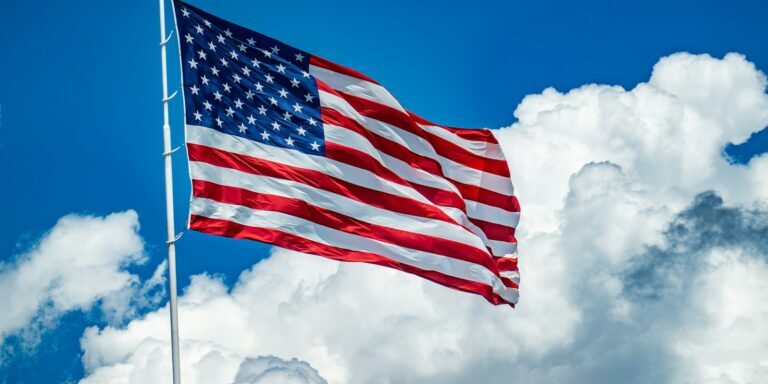 The US Flag flying high in the sky