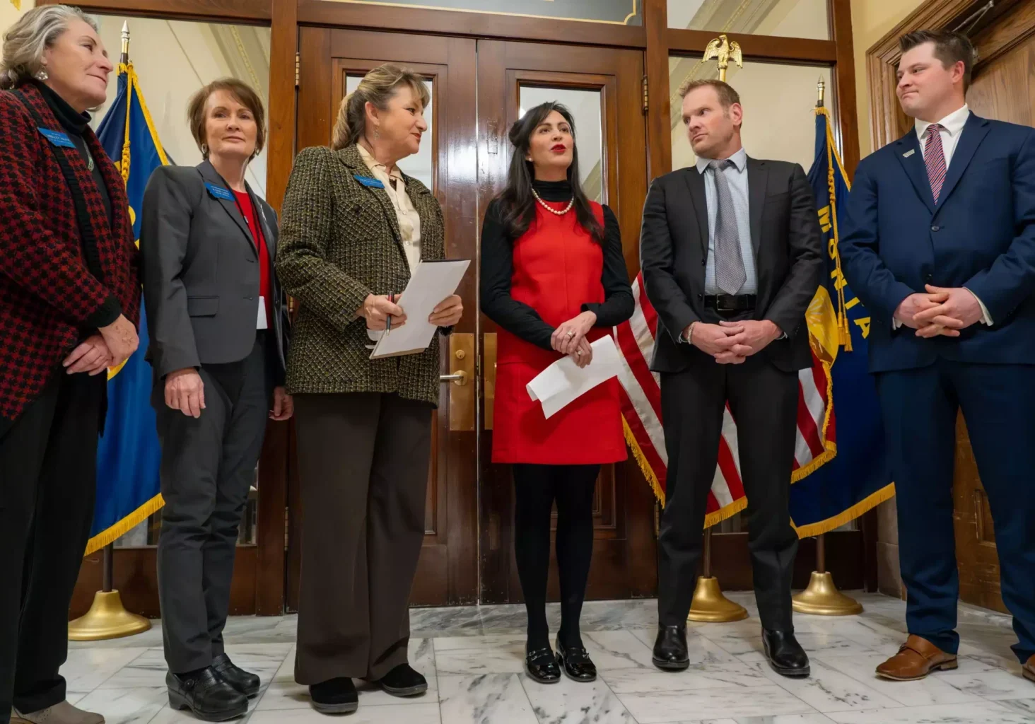Secretary of State Christi Jacobsen surrounded by staff and Montana Legislators including State Senator Theresa Manzella. February 13th, 2025. Photo provided by Montana Secretary of State Media Center.