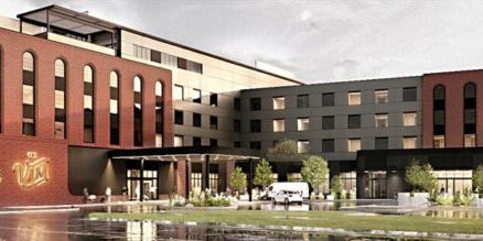 Modern Boutique Hotel Exterior with Red Brick Facade