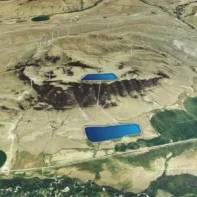 Hilltop Wind Farm with Dual-Reservoir Pumped-Storage