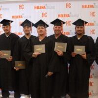 Helena-College-Graduation-2_April-2025-1 New Beginnings: Inmate students proudly display their diplomas at the third automotive technology graduation ceremony at Montana State Prison, marking a significant step towards skilled employment and successful reintegration.