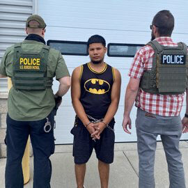 Homeland Security Investigations agents conduct an arrest operation Homeland Security Investigations agents conduct an arrest operation