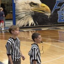 Two Young Referees on Court