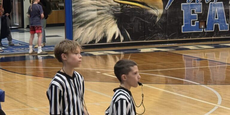Two Young Referees on Court