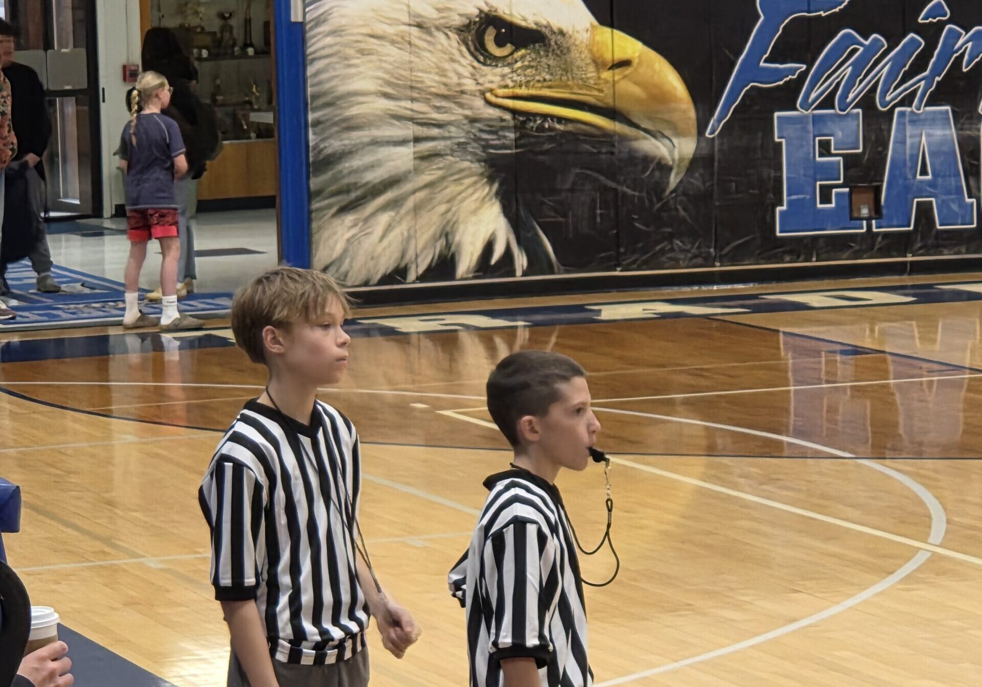 Two Young Referees on Court