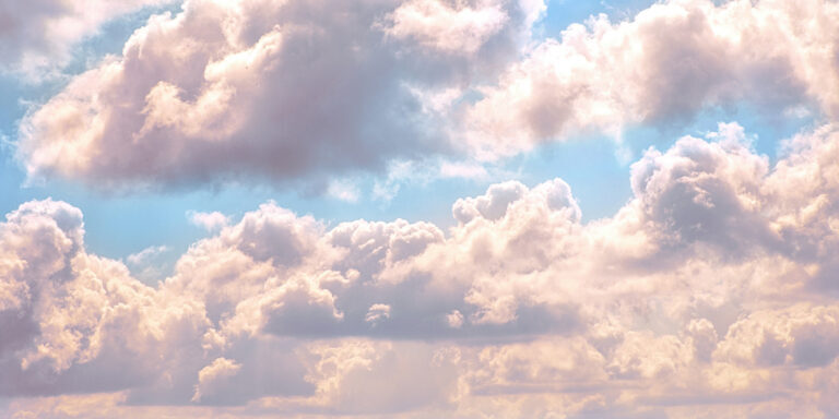 Serene Sky with Fluffy Clouds