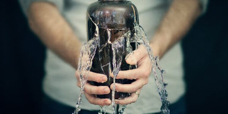 Cracked Vase with Water Leaking