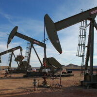 Row of Oil Pump Jacks in Operation Row of Oil Pump Jacks in Operation