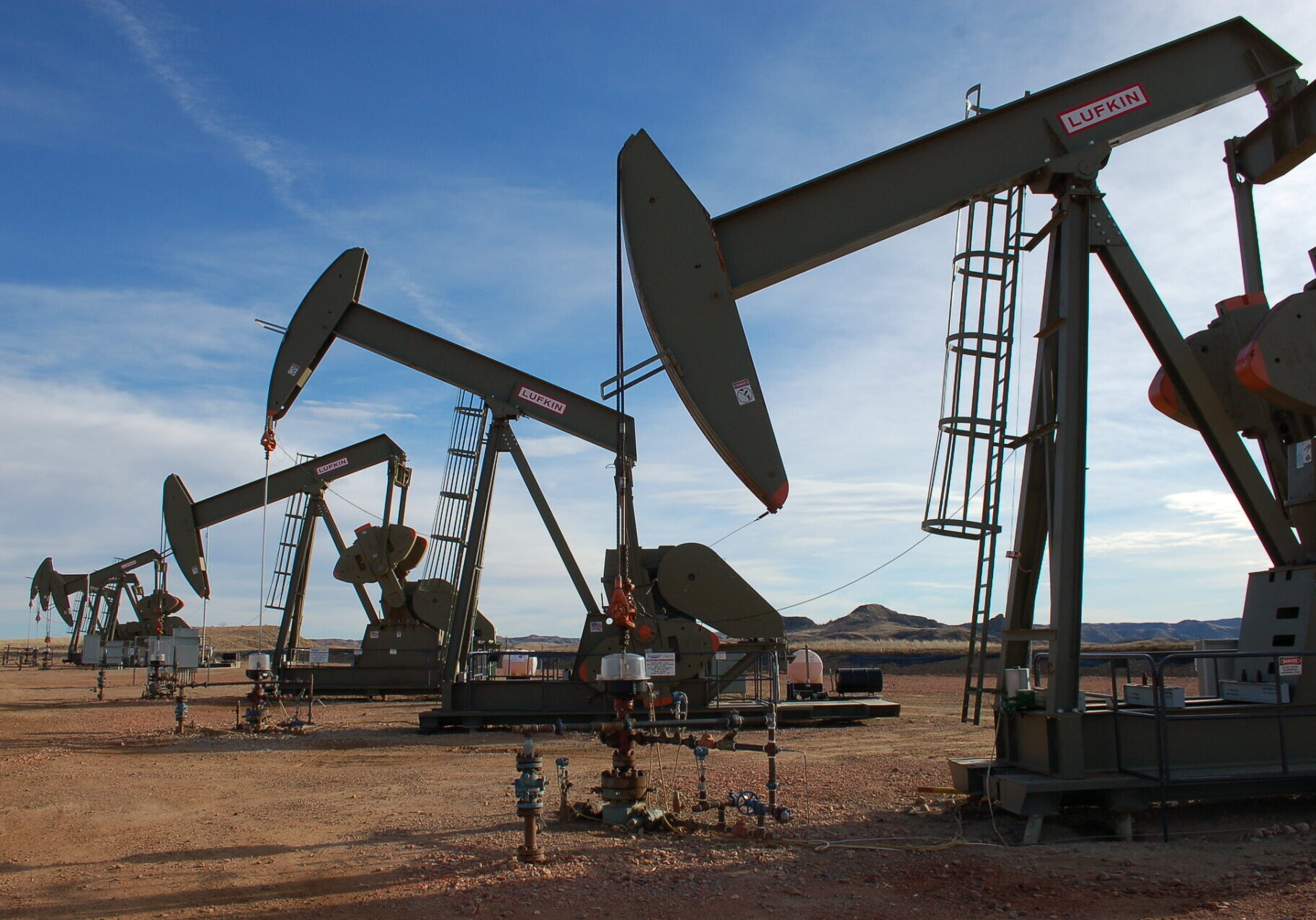 Row of Oil Pump Jacks in Operation
