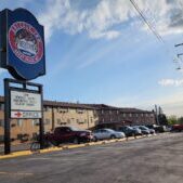 Grizzly Inn Motel Exterior at Sunset Grizzly Inn Motel Exterior at Sunset