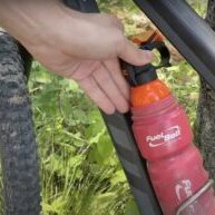 Mountain Bike Water Bottle with Unique Cap Mechanism Mountain Bike Water Bottle with Unique Cap Mechanism