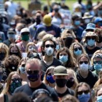 Protesters wear masks while attending a Black Lives Matter protest at Amador Valley Community Park in Pleasanton, Calif., on Friday, June 5, 2020. (Jose Carlos Fajardo/Bay Area News Group)