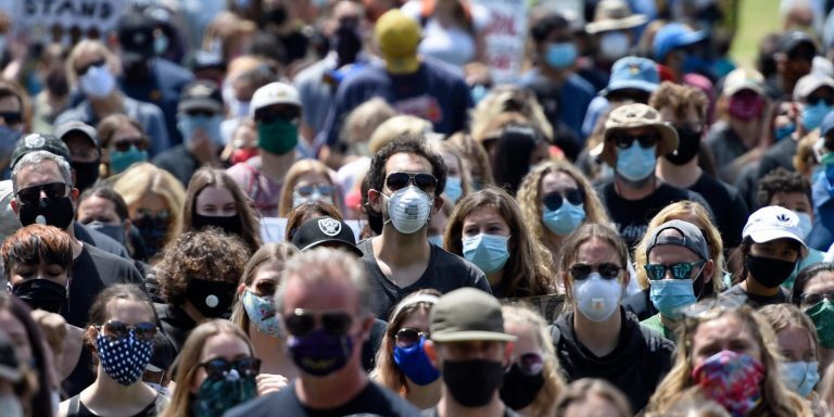 Protesters wear masks while attending a Black Lives Matter protest at Amador Valley Community Park in Pleasanton, Calif., on Friday, June 5, 2020. (Jose Carlos Fajardo/Bay Area News Group)