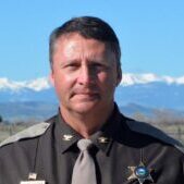 Sheriff Portrait with Mountain Backdrop Sheriff Portrait with Mountain Backdrop