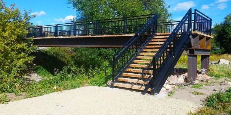Elevated Black Metal Pedestrian Bridge