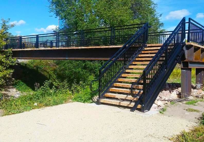 Elevated Black Metal Pedestrian Bridge