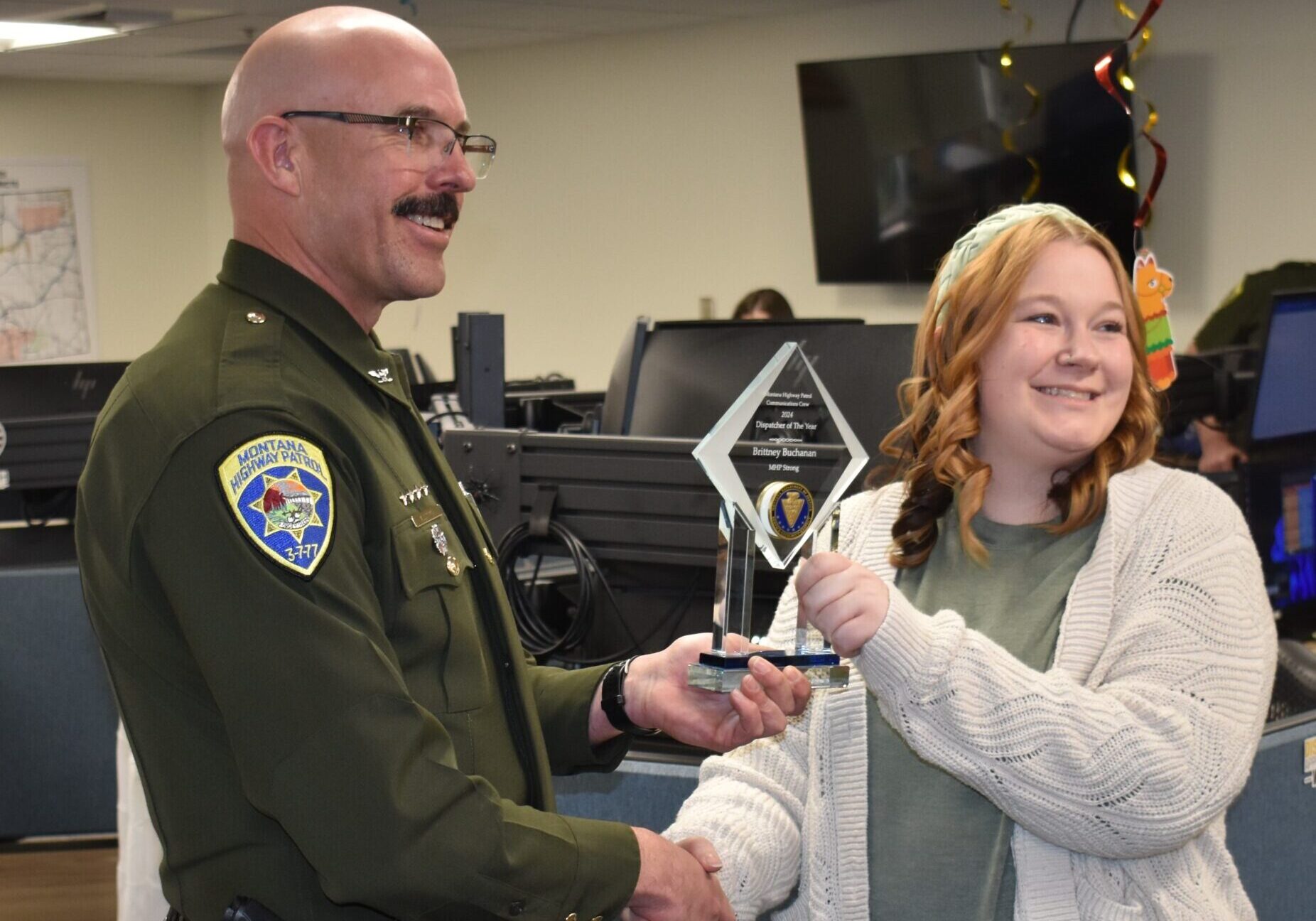 Montana Highway Patrol Dispatcher Brittney Buchanan accepts Dispatcher of the Year Award
