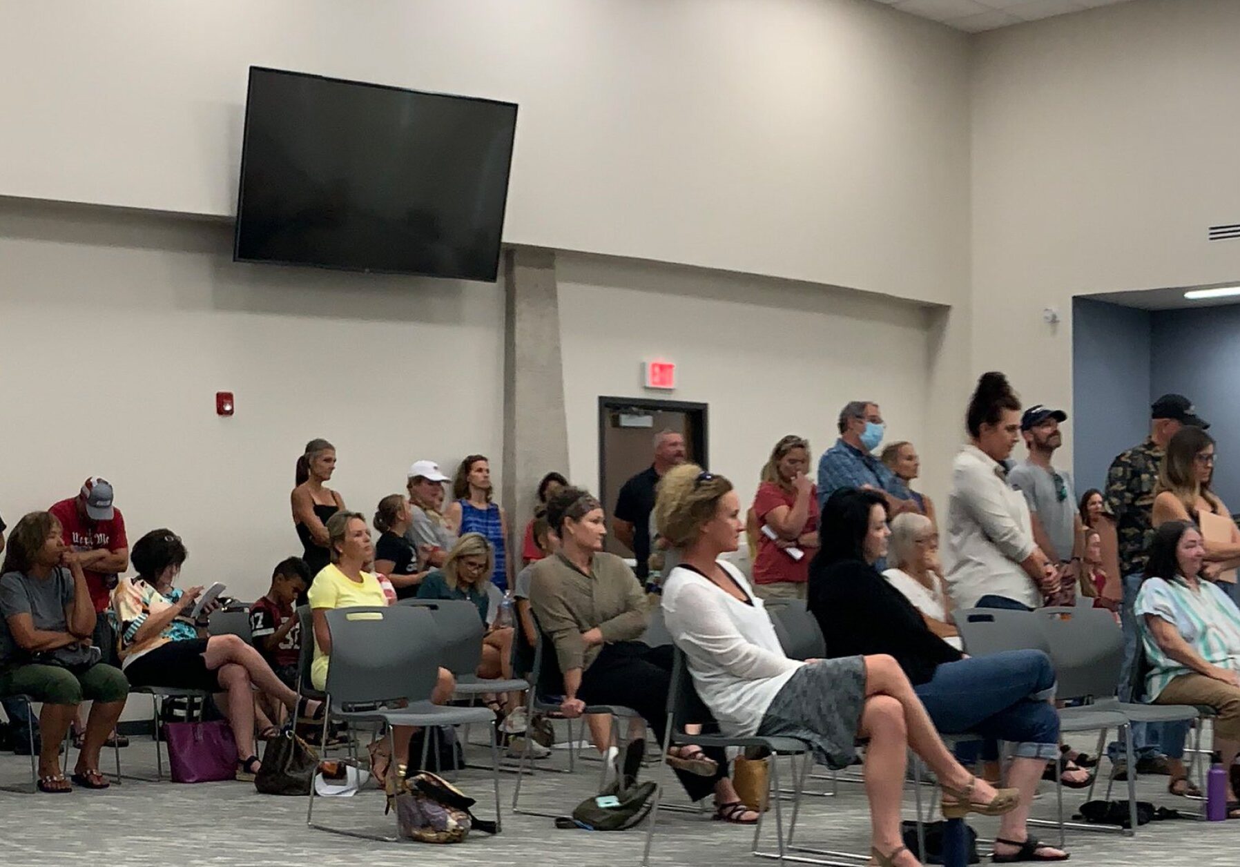 Parents stand for public comment during Missoula County Public Schools "COVID Task Force" meeting.