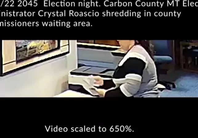 Carbon County Elections Administrator Crystal Roascio shredding what appear to be ballots on election night, November 2022.