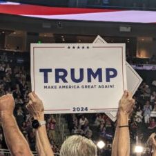 2024 RNC Convention attendee holds Trump sign 2024 RNC Convention attendee holds Trump sign