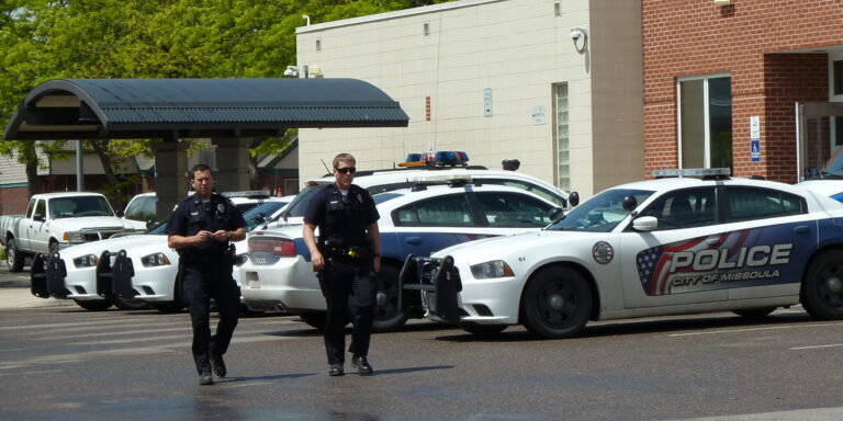 "<a href="https://www.flickr.com/photos/9749756@N06/27061717090" target="_blank" rel="noopener noreferrer">Missoula Police Department</a>" by <a href="https://www.flickr.com/photos/9749756@N06" target="_blank" rel="noopener noreferrer">rustejunk</a> is licensed under <a href="https://creativecommons.org/licenses/by-nc-nd/2.0/" target="_blank" rel="noopener noreferrer">CC BY-NC-ND 2.0</a>