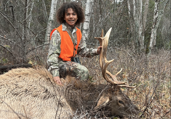 Successful Elk Hunt in Autumn Forest