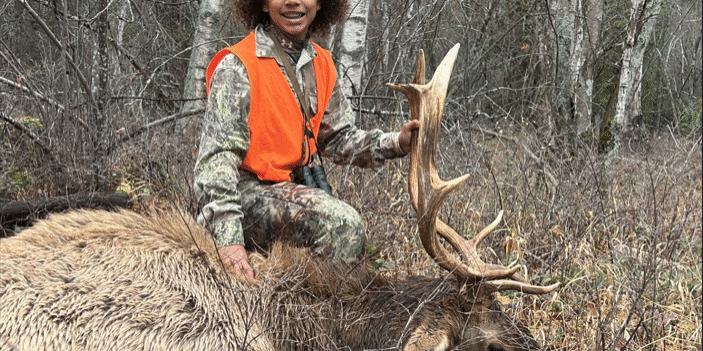 Successful Elk Hunt in Autumn Forest