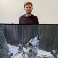 Man Showcases Wolf Family Painting Man Showcases Wolf Family Painting
