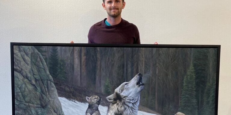 Man Showcases Wolf Family Painting