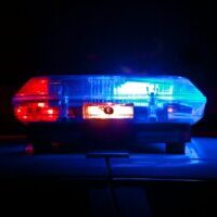 Photo by Scott Rodgerson blue bmw car in a dark room