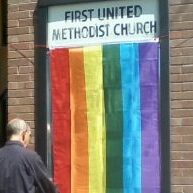 Missoula First United Methodist Church hangs "Pride Flag" outside Main Street entrance for "Pride Week" Missoula First United Methodist Church hangs "Pride Flag" outside Main Street entrance for "Pride Week." <a href="https://www.facebook.com/1stumcmissoula/photos/a.803756212981242/944913075532221">MFUMC Facebook, June 2015</a>.