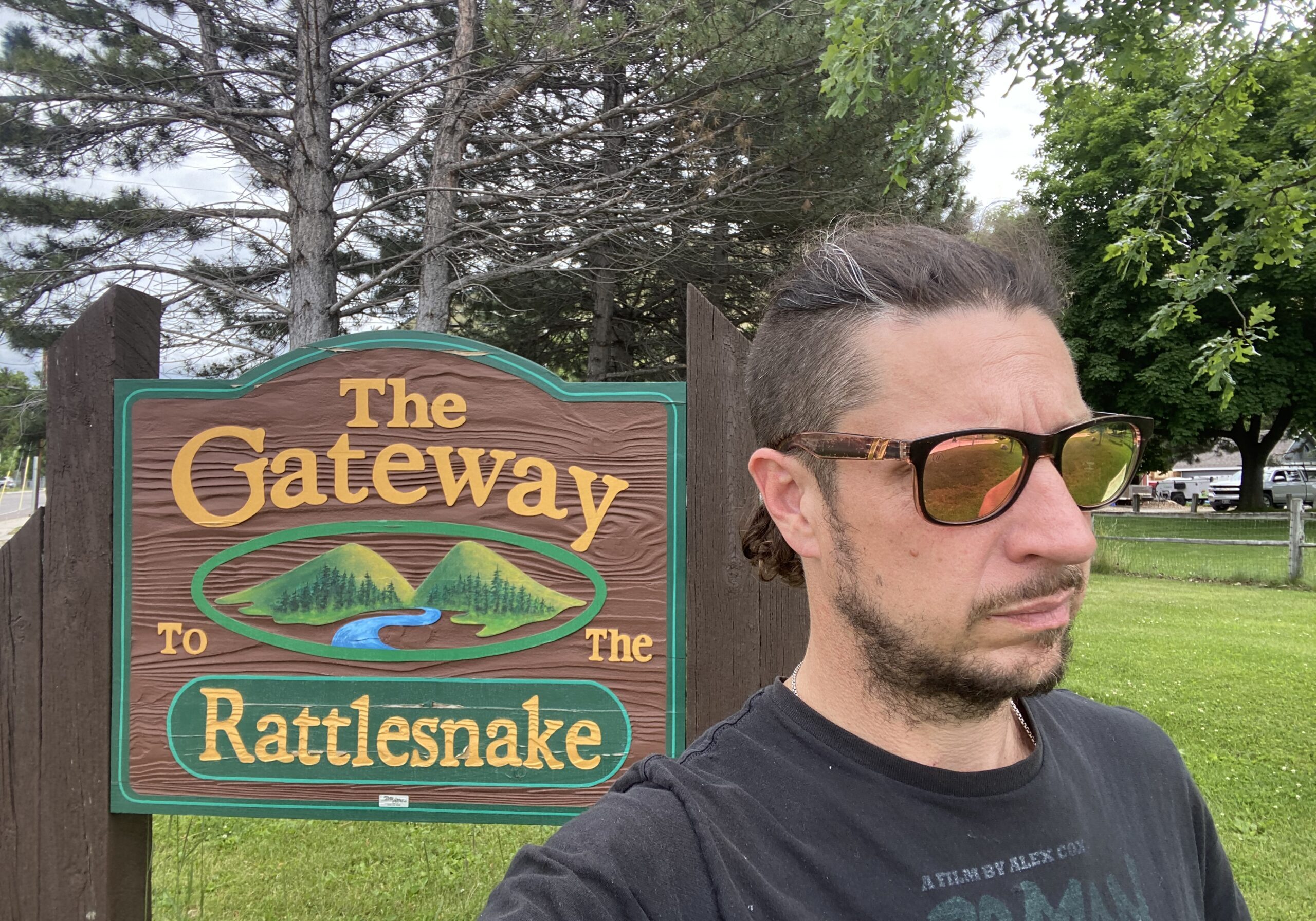 Sign in Sergeant Don Gregory Park that reads, "The Gateway To The Rattlesnake".