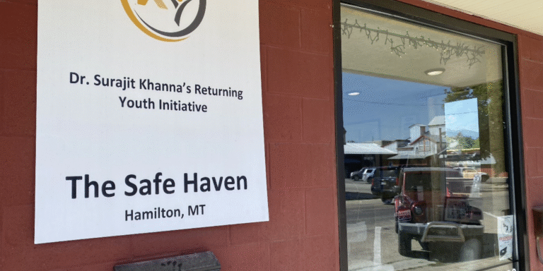 A sign outside the Hamilton, Montana location for Dr. Surajit Khanna's Returning Youth Initiative named "The Safe Haven"