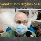 Dr. Ted Noel shows by vaping how air particles easily move around surgical mask. Dr. Ted Noel shows by vaping how air particles easily move around surgical mask.