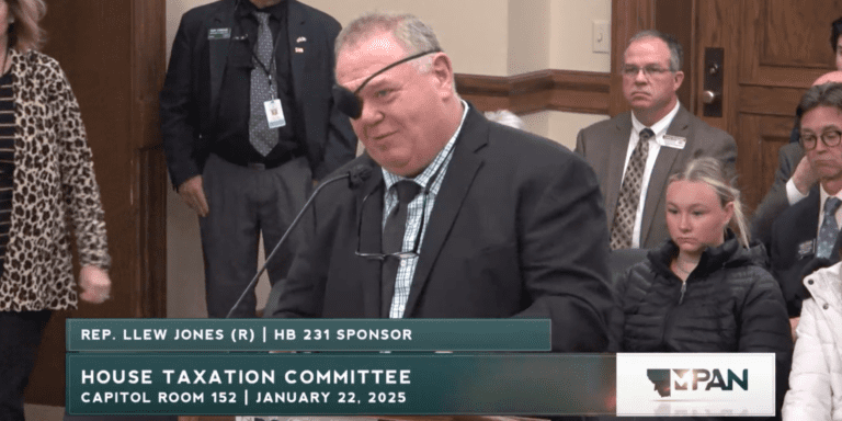 Rep. Llew Jones (HD 18) speaks to House Taxation Committee as sponsor of HB 231