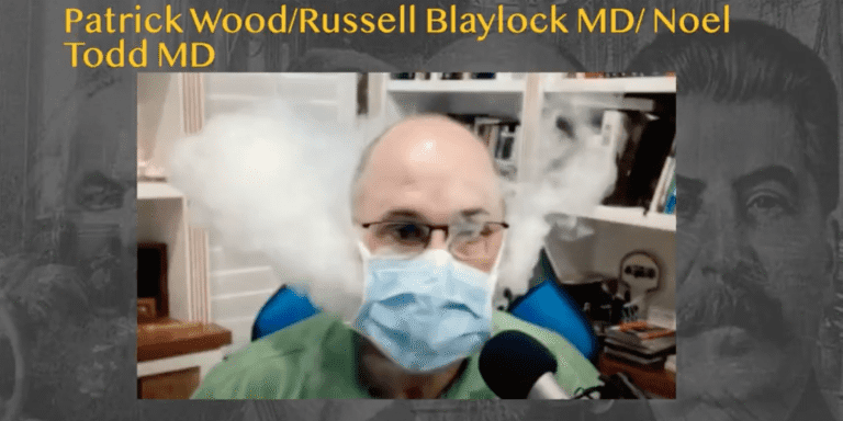 Dr. Ted Noel shows by vaping how air particles easily move around surgical mask.