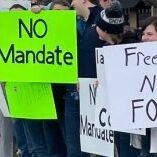 Missoulians lined up in support of healthcare workers at a rally against vaccine mandates on North Reserve Street Saturday, November 28, 2021. Missoulians lined up in support of healthcare workers at a rally against vaccine mandates on North Reserve Street Saturday, November 28, 2021.