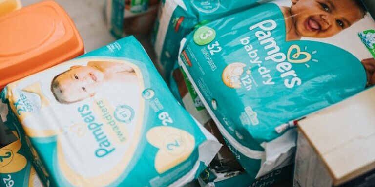 blue and white plastic pack of diapers