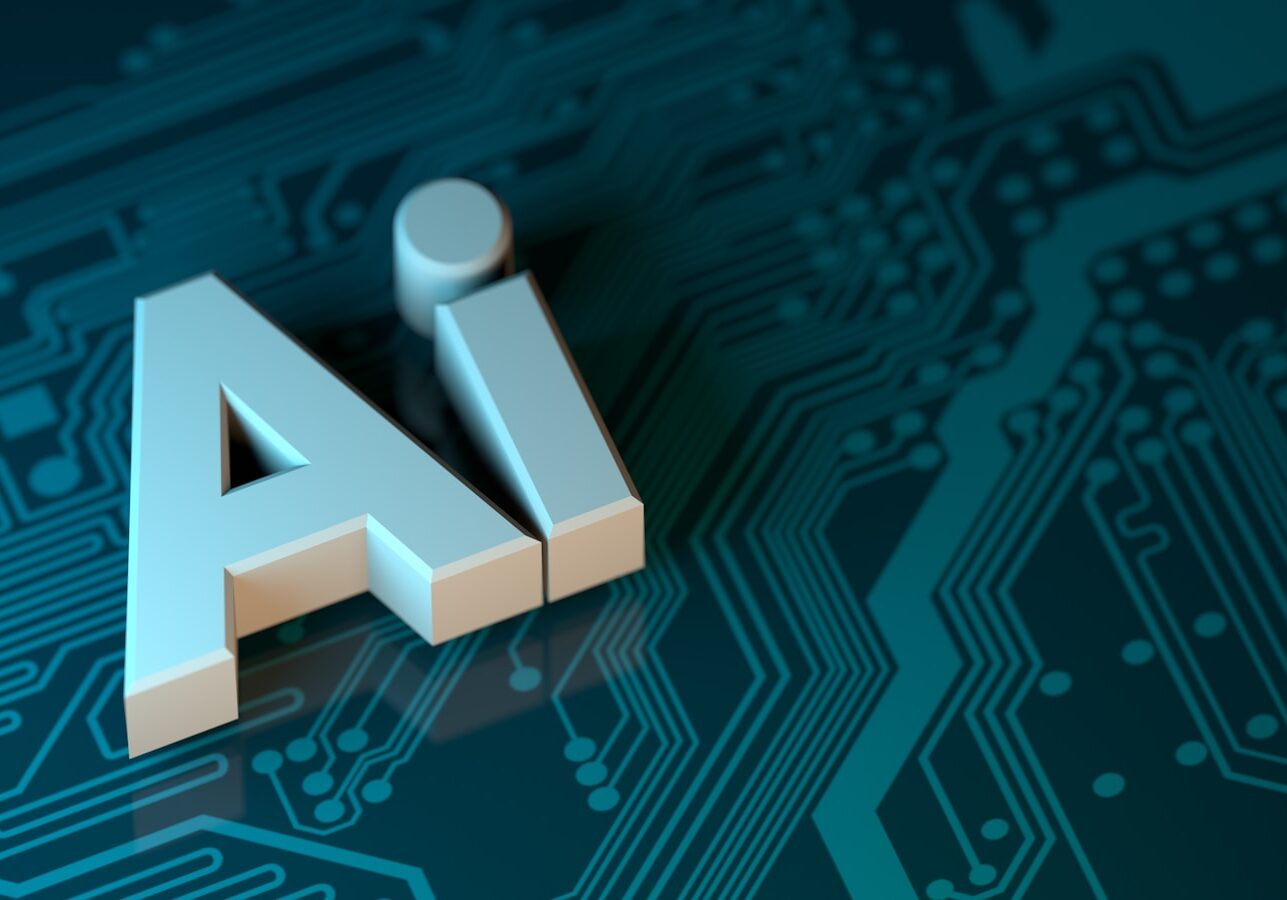 Photo by Numan Ali the letter a is placed on top of a circuit board