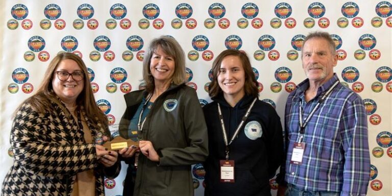 Rod and Lisa Cline, owners of Cut Bank Marketplace on Main, and store manager Jacey Hannon win the 2025 Retailer of the Year Award at the Made in Montana Trade Show in Helena.