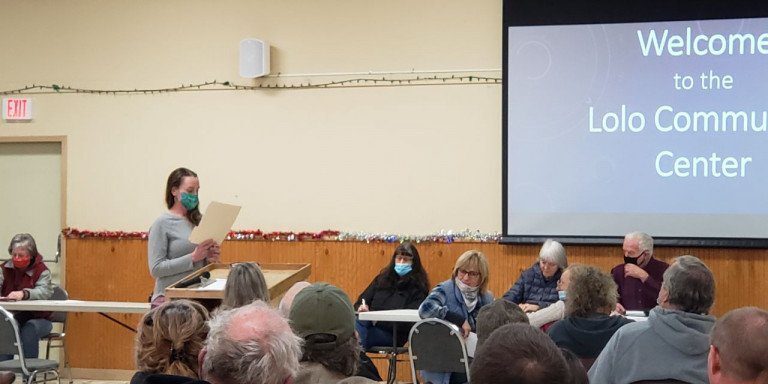 Jessica Harrell, outreach coordinator for Missoula Food Bank, shares warning from Director Aaron Brock. Missoula County Tyranny photo.