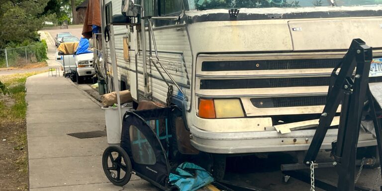 Many people in vehicles lined up on Hawthorne Street behind The Poverello Center have been camping at the intersection of Pine for over a year.