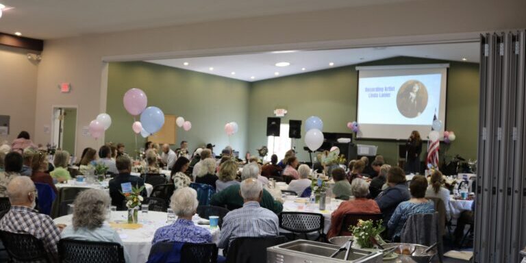 Attendees enjoy dinner while international recording artist Linda Lanier speaks during the "Celebrate Life MT" fundraiser