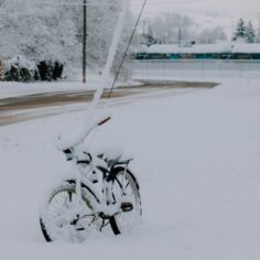 Photo by Ashe Walker a bike that is sitting in the snow