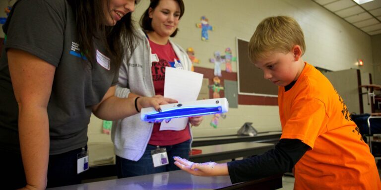 Hand Hygiene Education with UV Light Demonstration