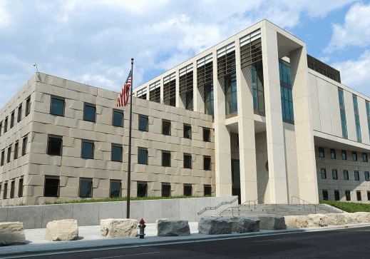 Modern Courthouse Exterior with American Flag Modern Courthouse Exterior with American Flag